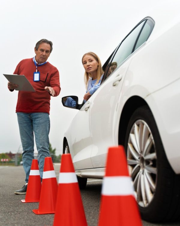 person-taking-driver-s-license-exam_23-2149891408